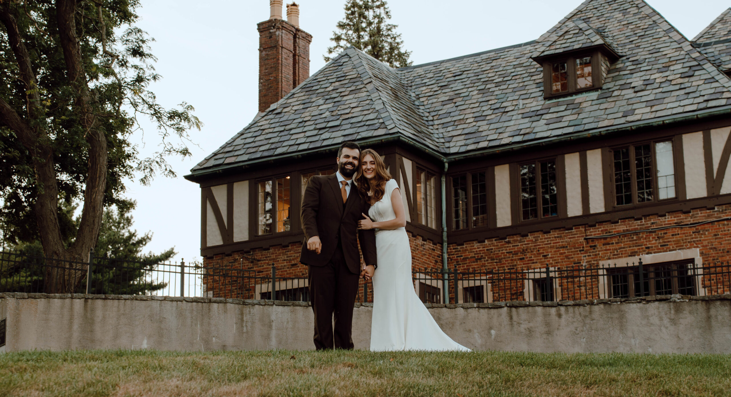 Vows right outside the Pine knob mansion on the golf course